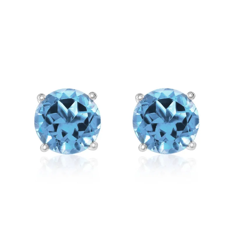 Polished gold earrings-Smyth Jewelers 14k Gold Swiss Blue Topaz Stud Earrings