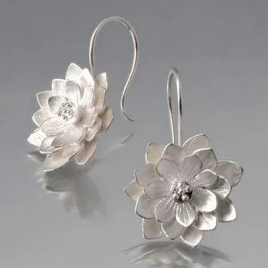 Polished charm earrings-Lotus Sterling Silver Loop Earrings